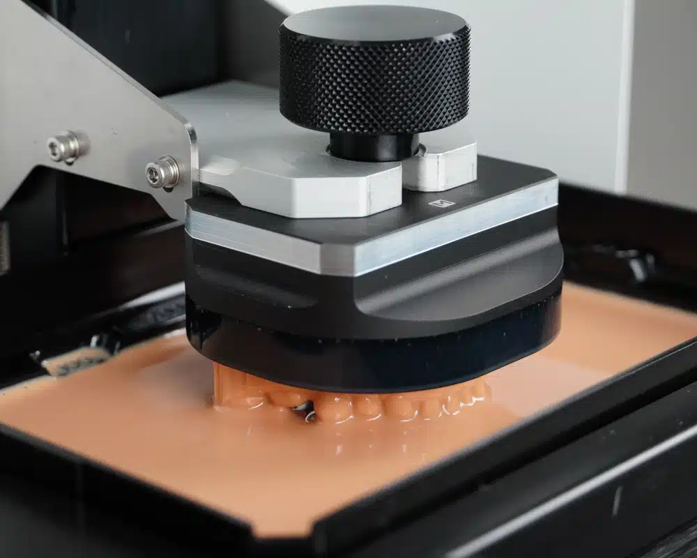A Dental 3D Printer's Build Platform performing a print